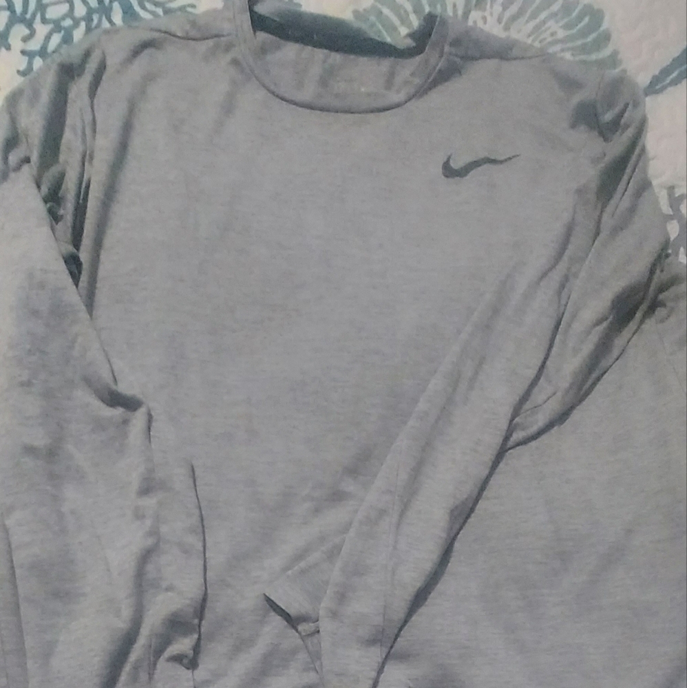 Nike and Under Armour long sleeve base layer bundle of 2 shirts.